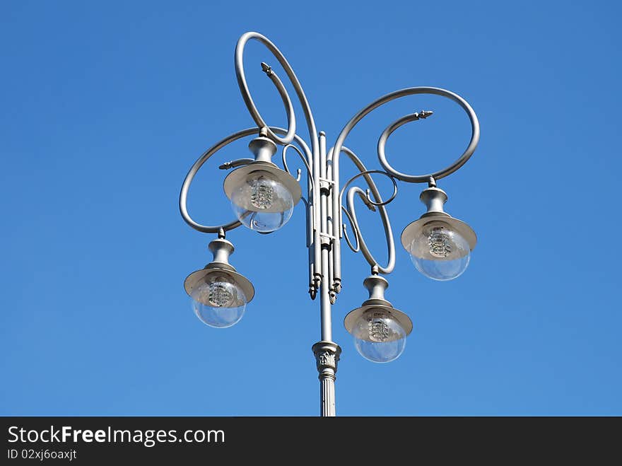 Street - light abstract against blue sky. Street - light abstract against blue sky