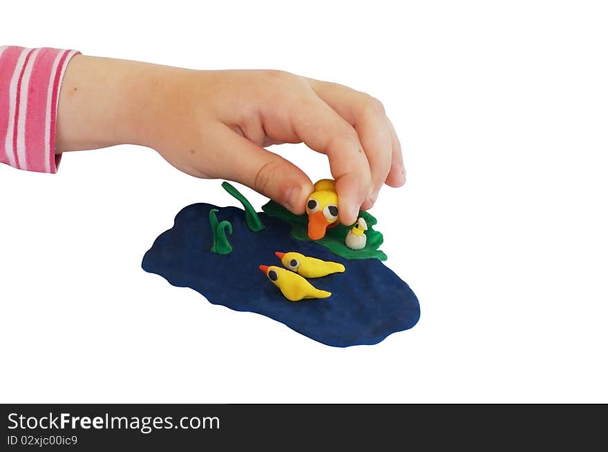 Child Hand Makes A Plasticine Composition