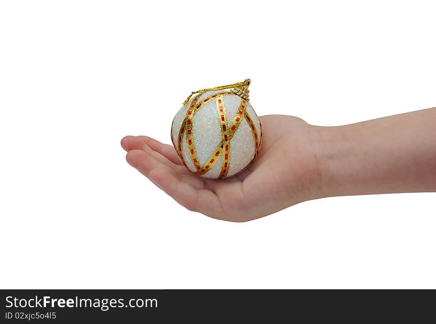 Child hand holding christmas ball isolated on white