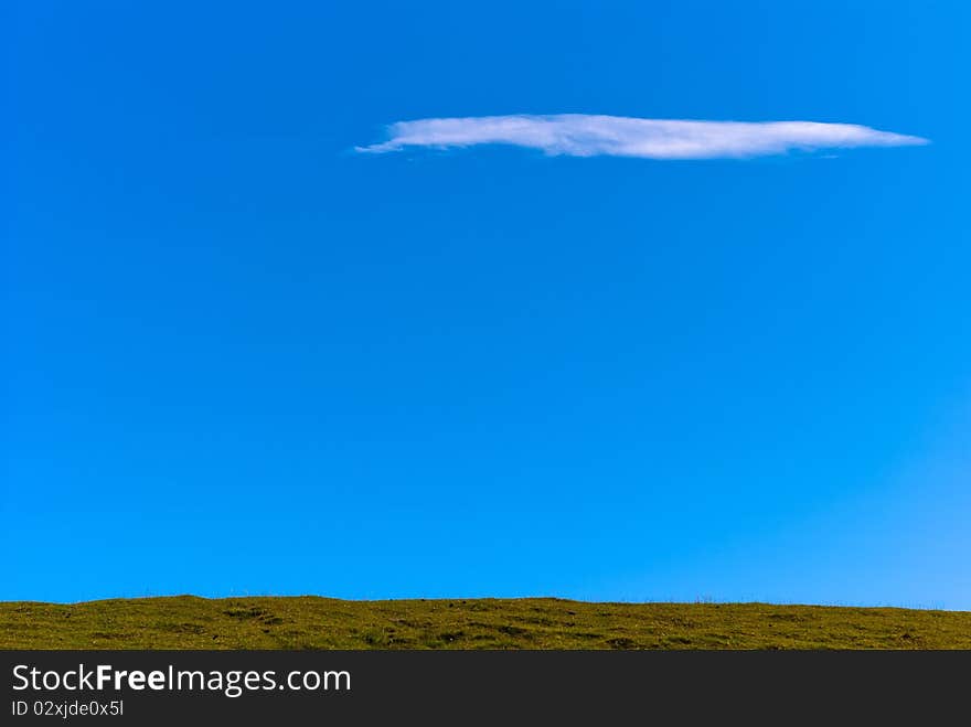 Meadow against a blue sky