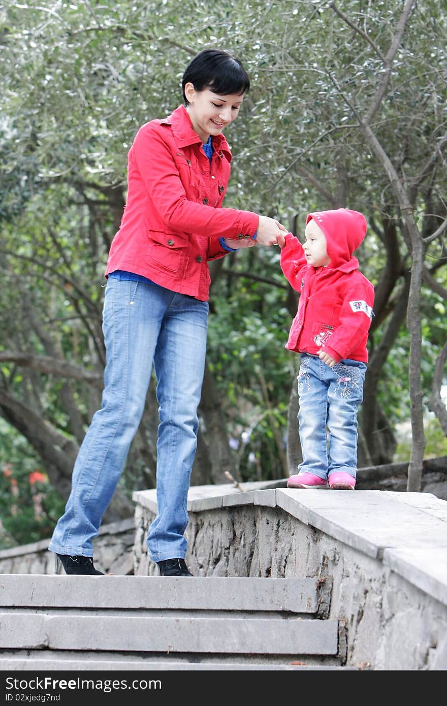 Mother And Daughter In Park