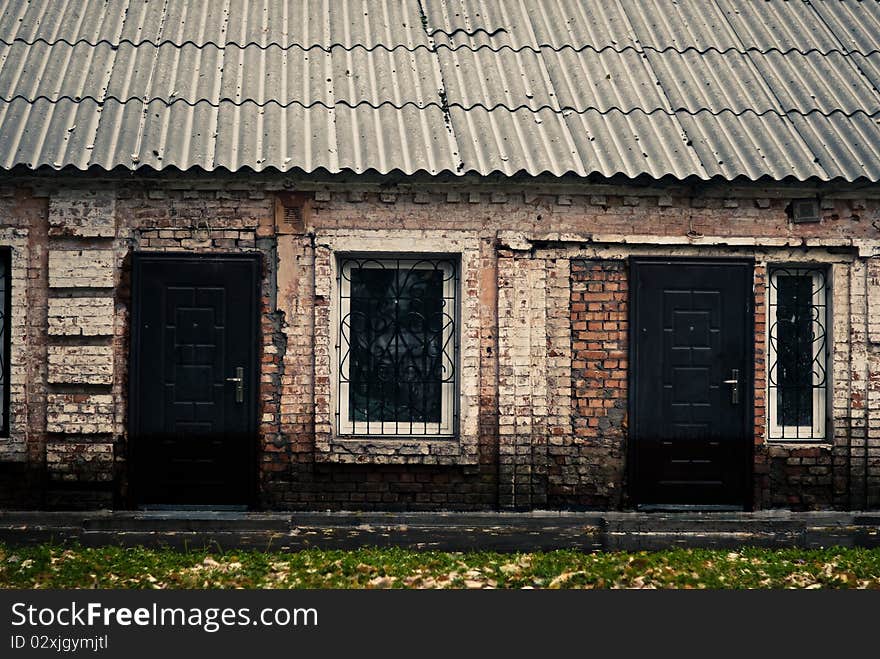 Old building at rainy fall season weather