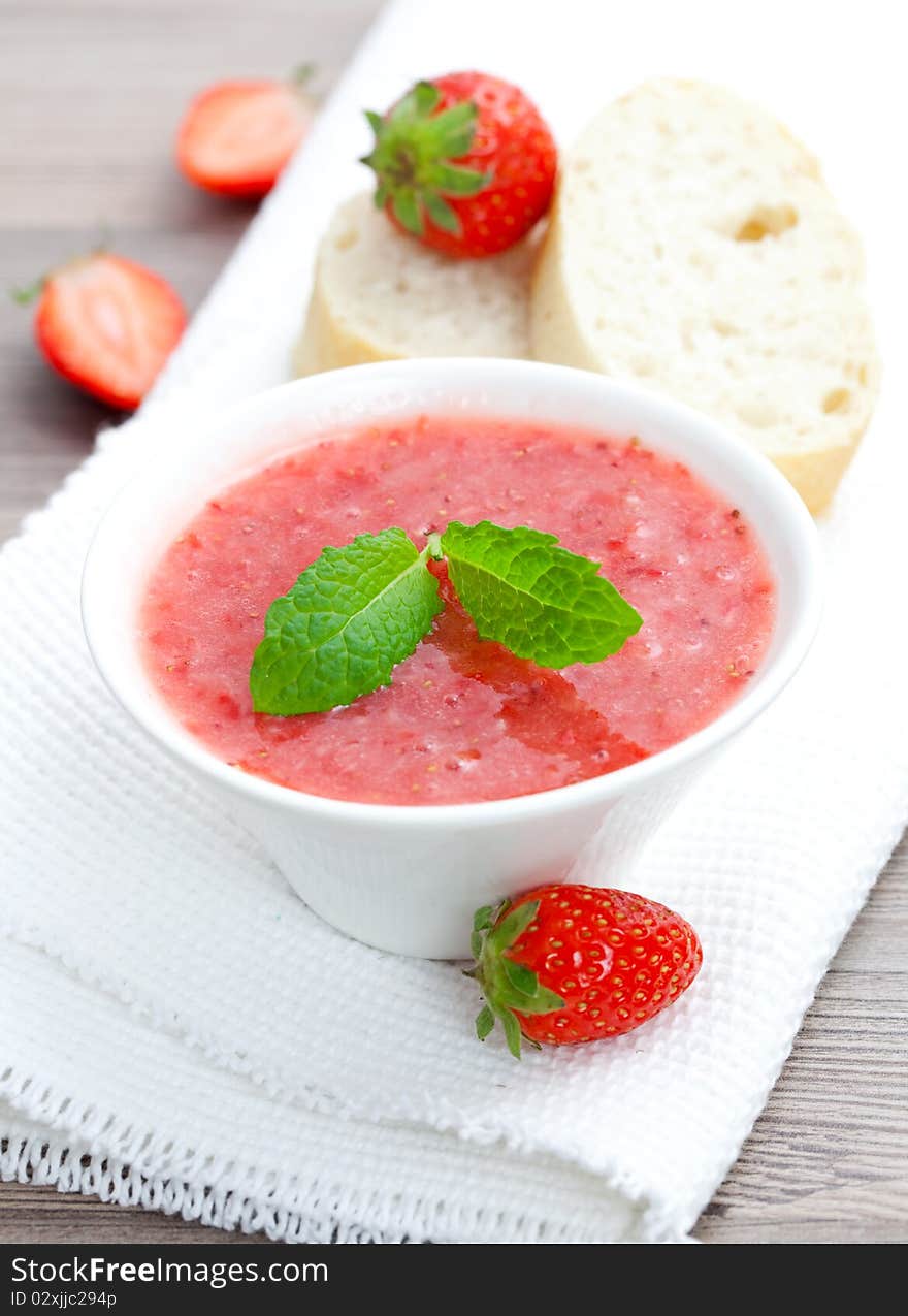 Fresh strawberry jam in bowl closeup