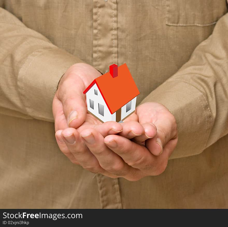 House as a gift in hands