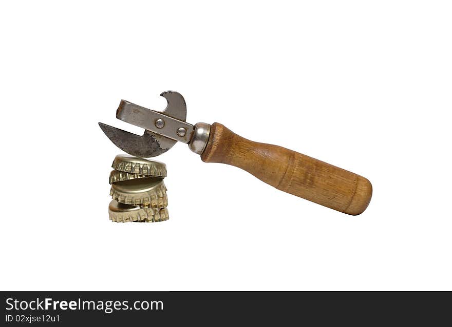 Stack of bottle caps and old opener isolated on white background. Stack of bottle caps and old opener isolated on white background