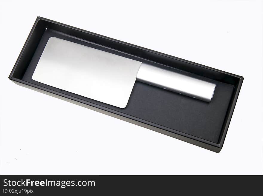 Chinese cleaver in a dark box. (on white background)