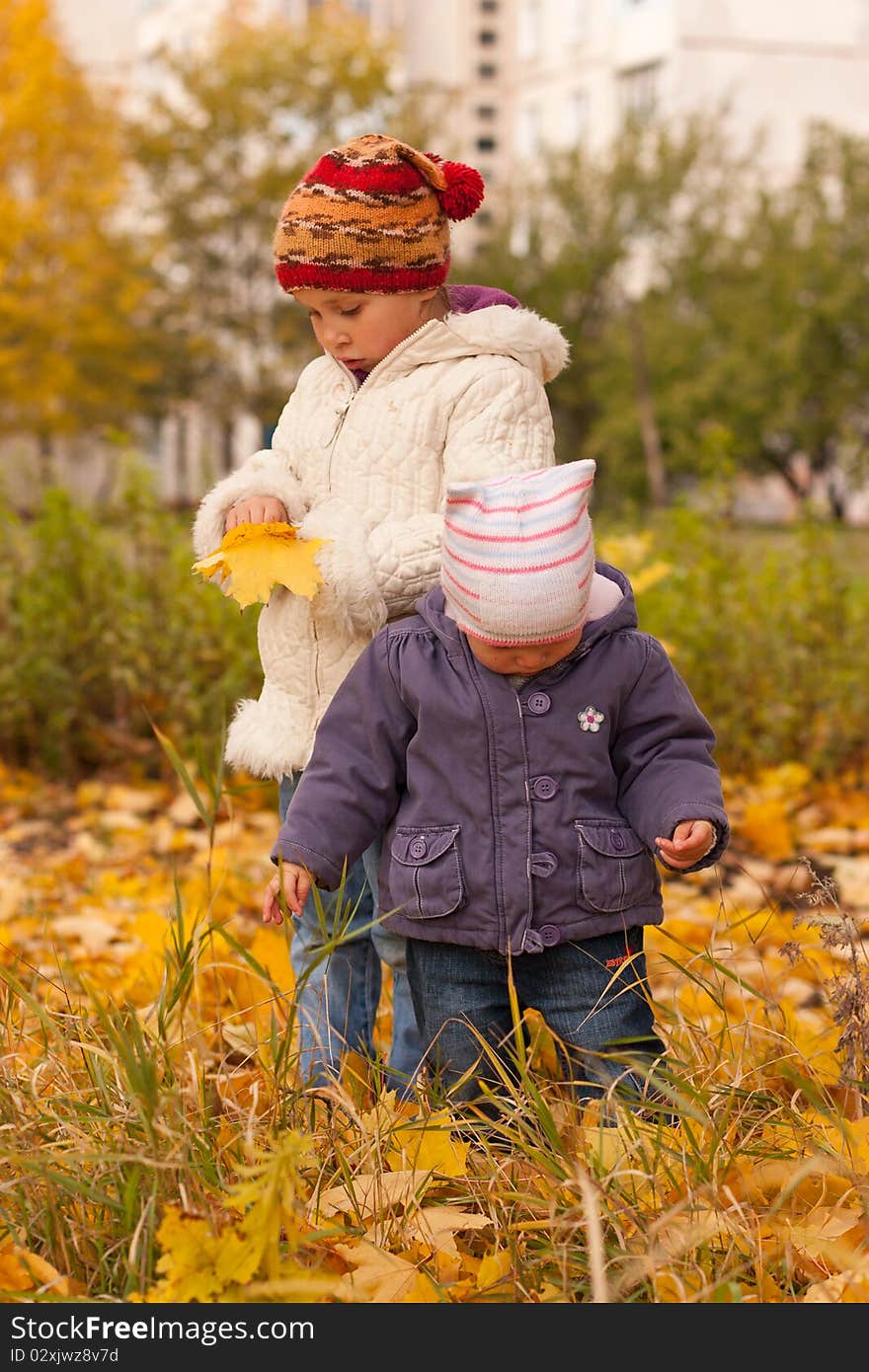 Children playing in autumn