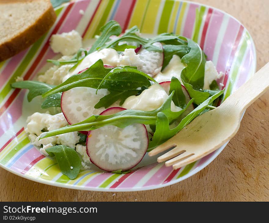 Fresh vegetable salad with cottage cheese and arugula. Fresh vegetable salad with cottage cheese and arugula