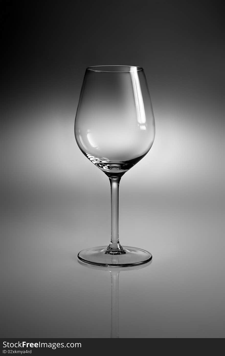 Basic glass with reflex on neutral background. Basic glass with reflex on neutral background