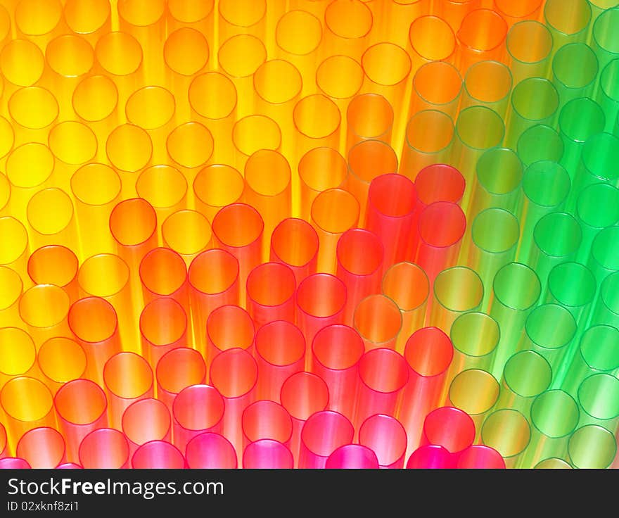 Abstract colourful background of a cocktail straws