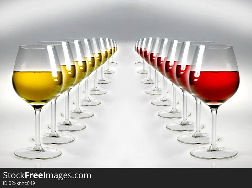 Geometry of double raw of glasses with red and white wine