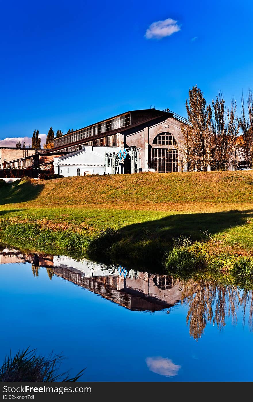 The factory constructed in 1913 is displayed in river water. The factory constructed in 1913 is displayed in river water