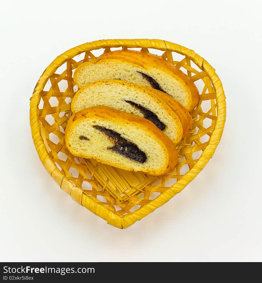 Meat loaf with poppy seeds in the basket heart.