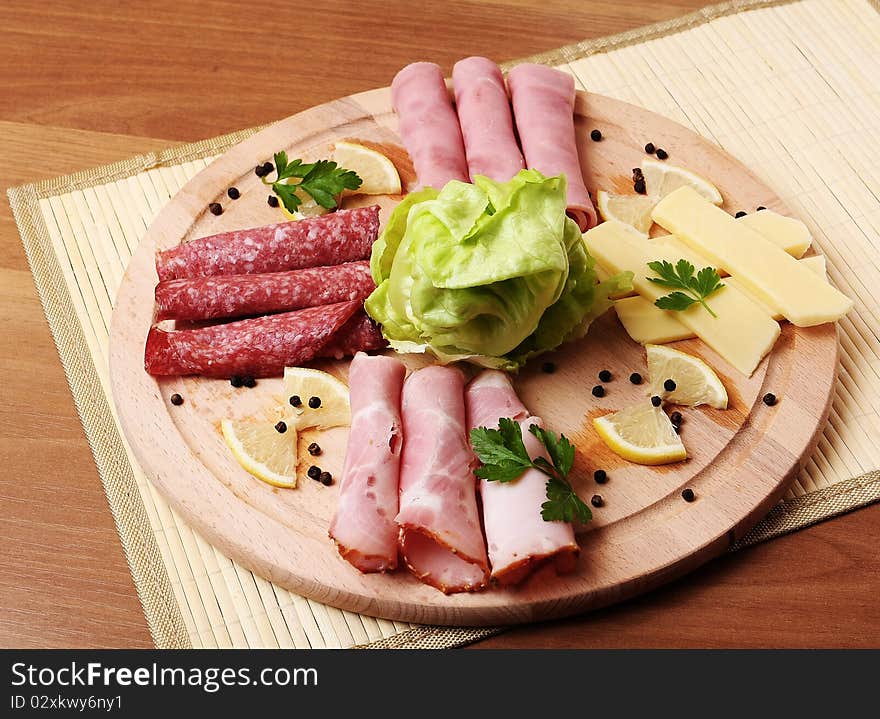 Traditional ham plate in a rustic restaurant