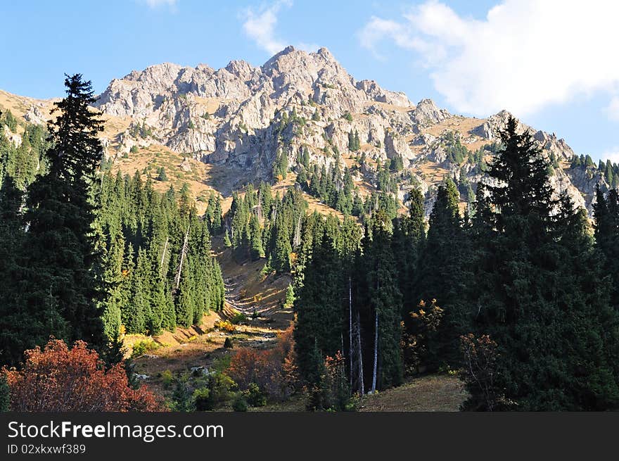 Mountain top in tien shan mountains near almaty kazakhstan on a sunny fall day. Mountain top in tien shan mountains near almaty kazakhstan on a sunny fall day