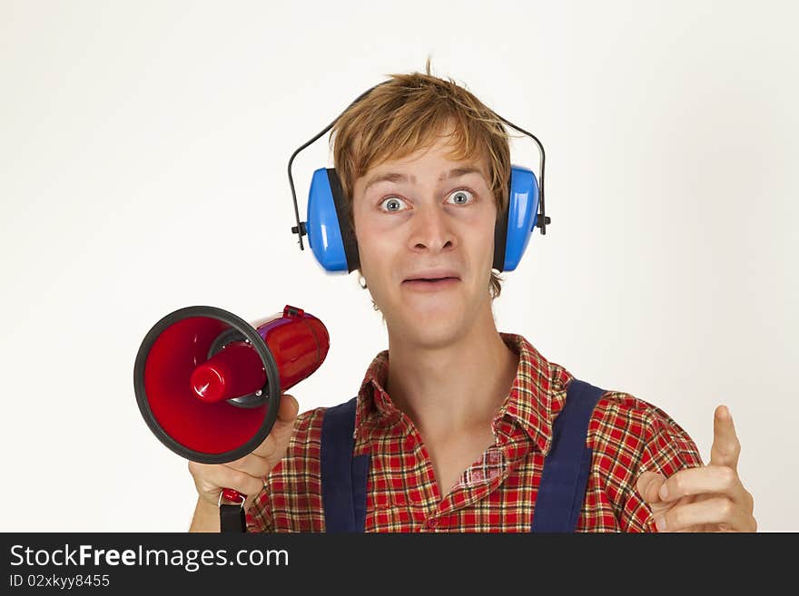 Young handcrafter with megaphone isoladet on white background. Young handcrafter with megaphone isoladet on white background