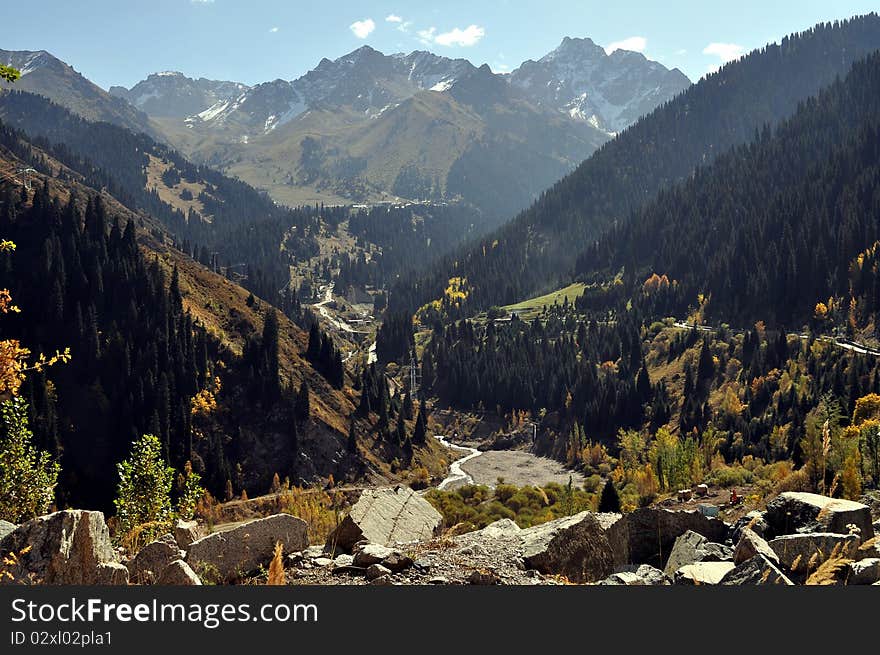 Mountain top in tien shan mountains near almaty kazakhstan on a sunny fall day. Mountain top in tien shan mountains near almaty kazakhstan on a sunny fall day