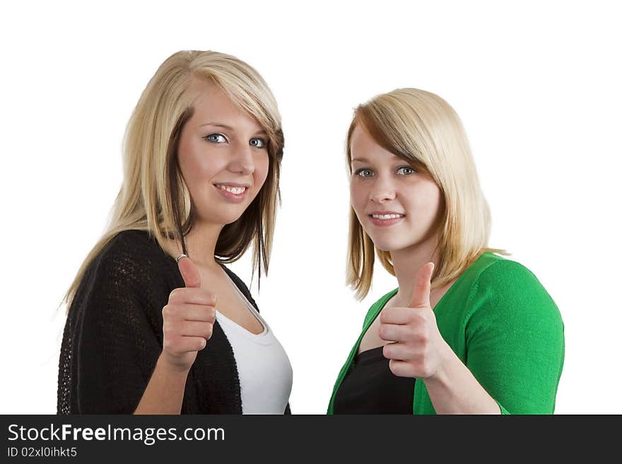 Two young caucasian girlfriends having fun together  isolated over white background. Two young caucasian girlfriends having fun together  isolated over white background