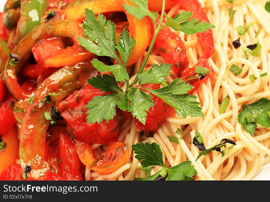 Close-up of pasta with tomato sauce and parsley. Close-up of pasta with tomato sauce and parsley.