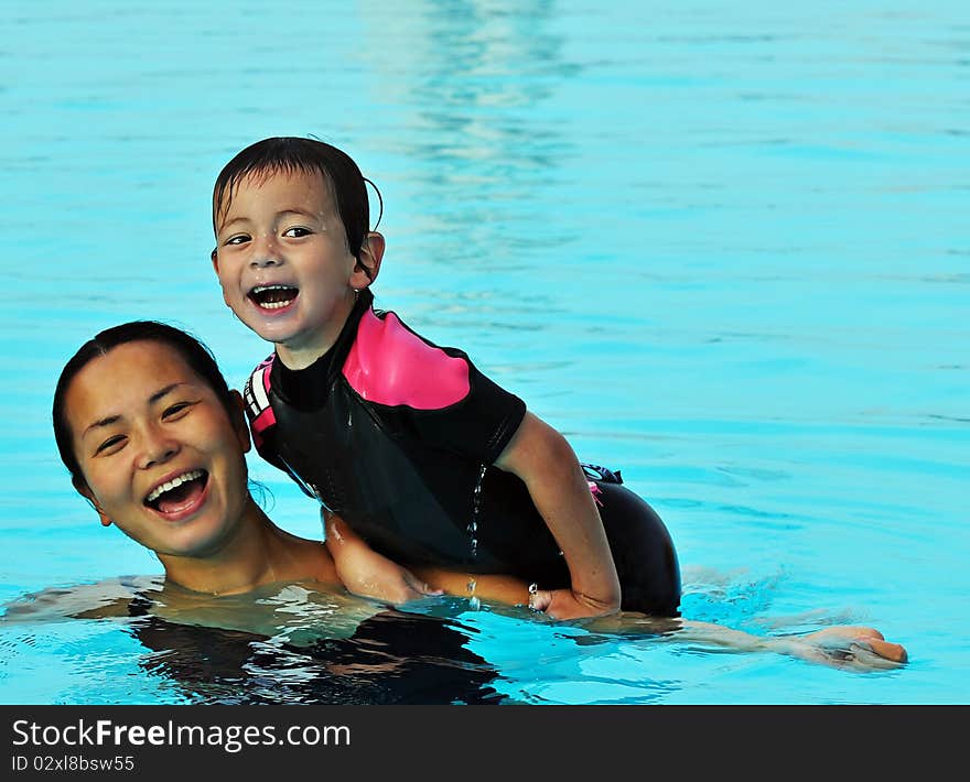 Mum and Son in Pool