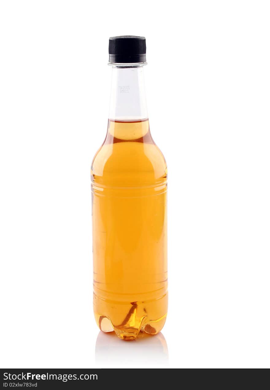 A bottle of beer is slanted with white background