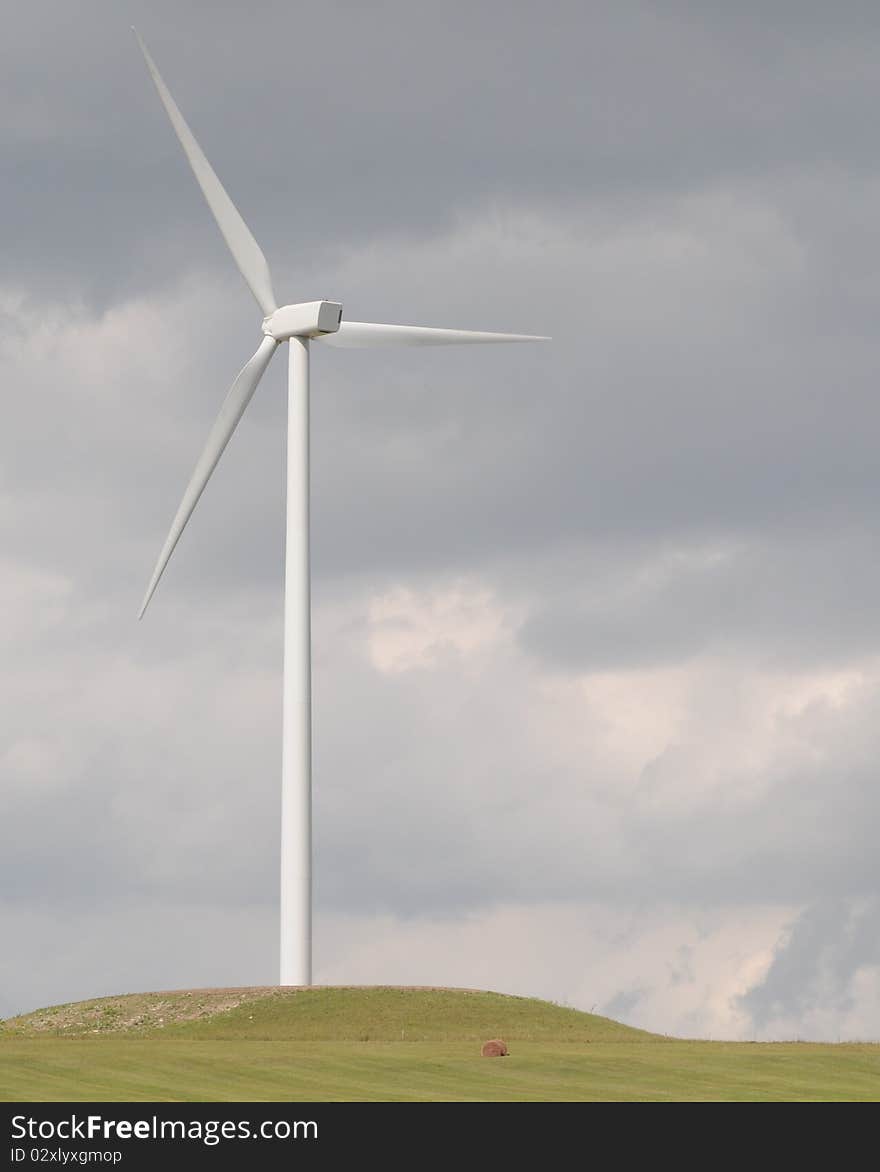 Windmill on a hill in Kansas. Windmill on a hill in Kansas