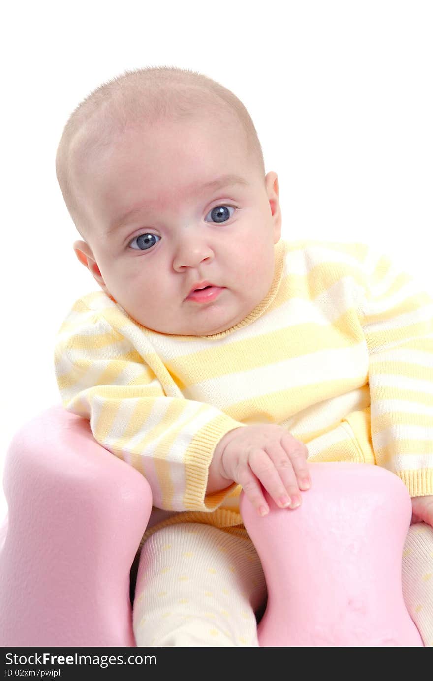 Photograph of cute baby with toy isolated against white. Photograph of cute baby with toy isolated against white