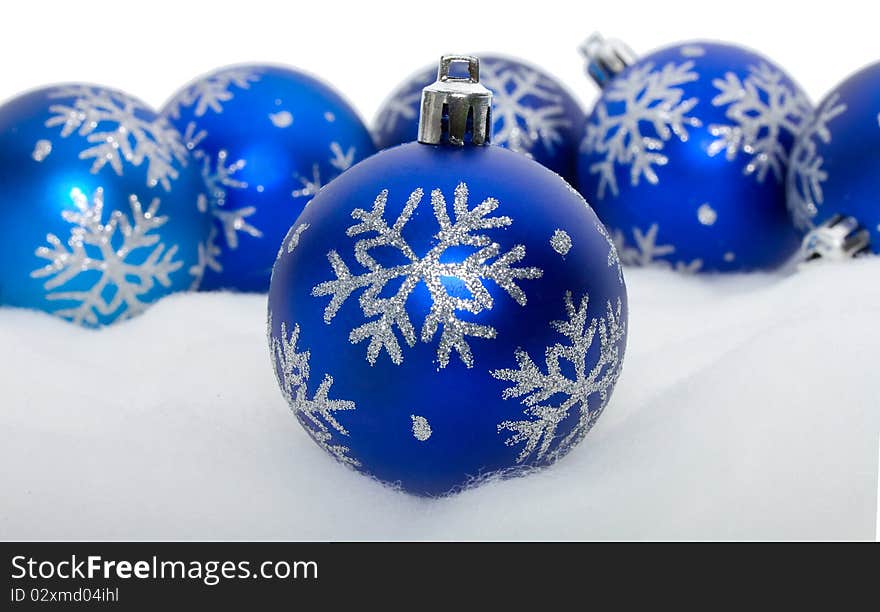 Close-up blue balls with snowflakes, isolated on white