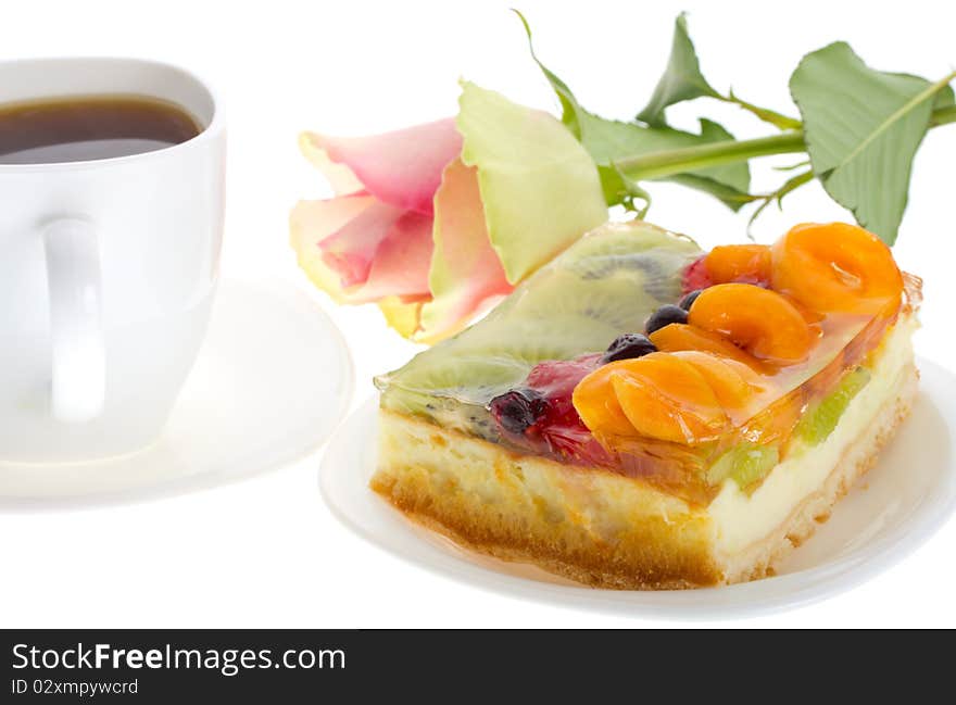 Close-up curd cake with fruits and rose, isolated on white