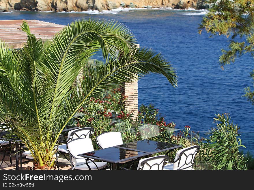 Table at a restaurant overlooking ocean views. Table at a restaurant overlooking ocean views