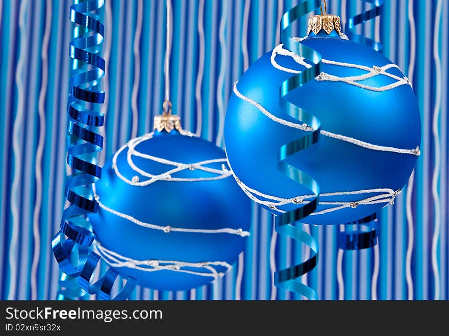 Christmas decoration from two blue balls on blue background. Christmas decoration from two blue balls on blue background