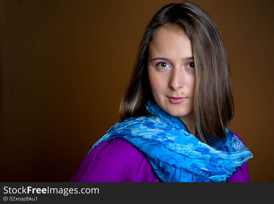 Young and beautiful woman posing in the studio. Young and beautiful woman posing in the studio