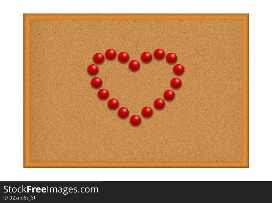 Red pushpins in a shape of a heart