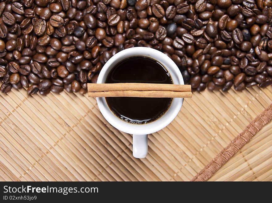 Coffee cup and coffee beans