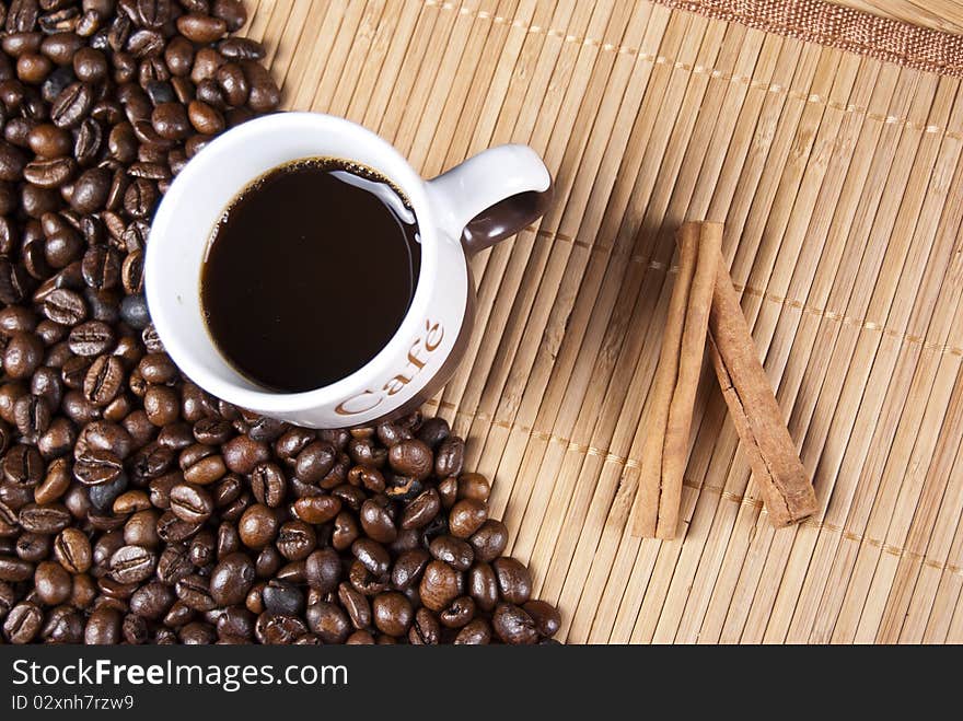 Coffee cup and coffee beans top view