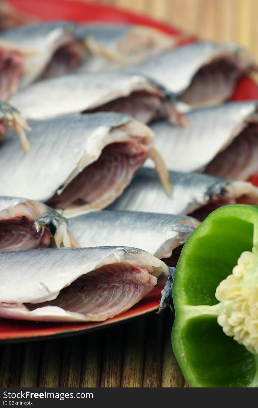 Fresh fish on ice decorated for sale at market