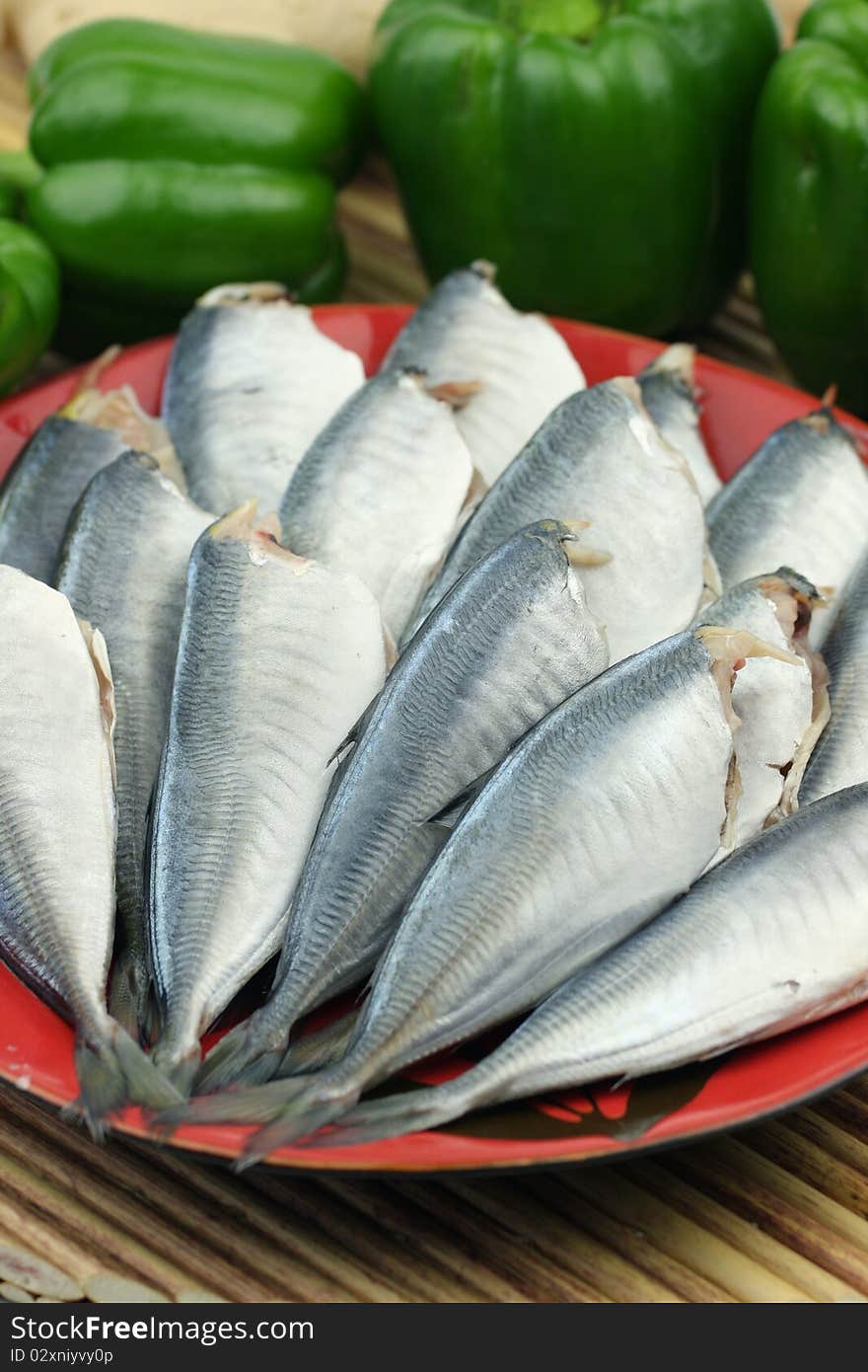 Fresh fish on ice decorated for sale at market