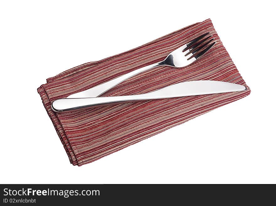 Knife and fork on a napkin as a dining room serving.