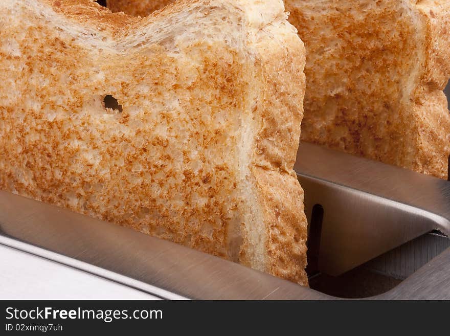 A toaster and a special bread for toast.