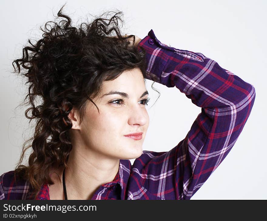 Young woman posing in purple shirt