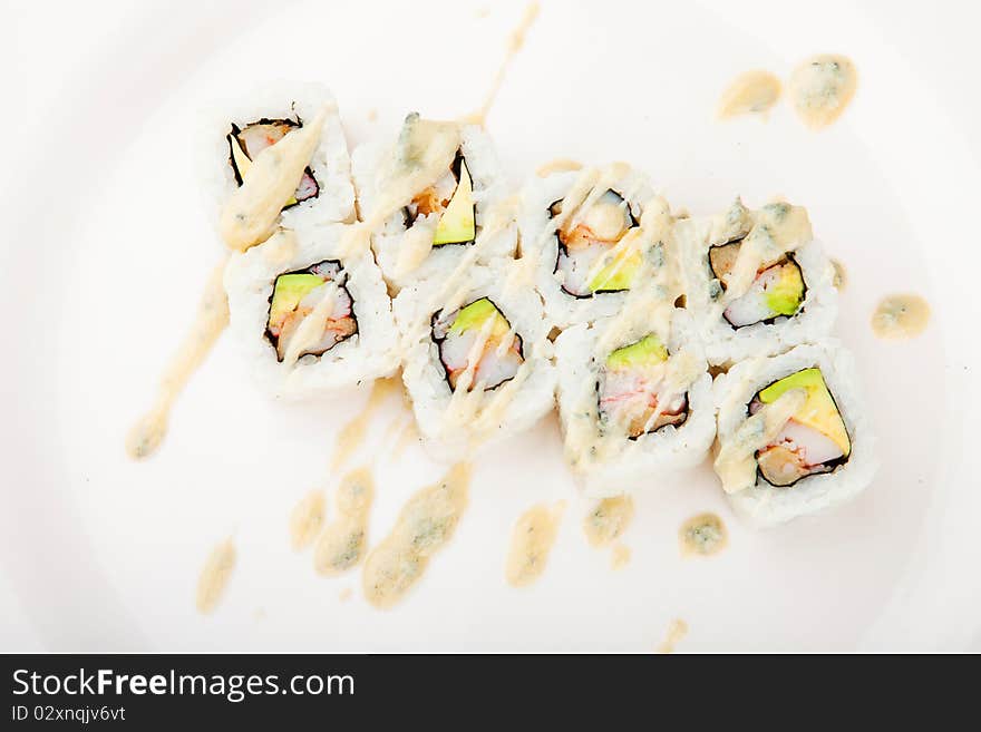 Maki rolls and sashimi isolated on white background. Maki rolls and sashimi isolated on white background