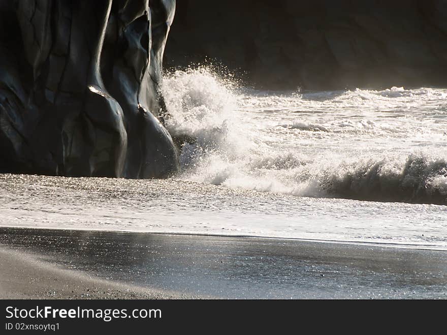 Wave on rocks shiny and smooth on the beaches of Iceland. Wave on rocks shiny and smooth on the beaches of Iceland