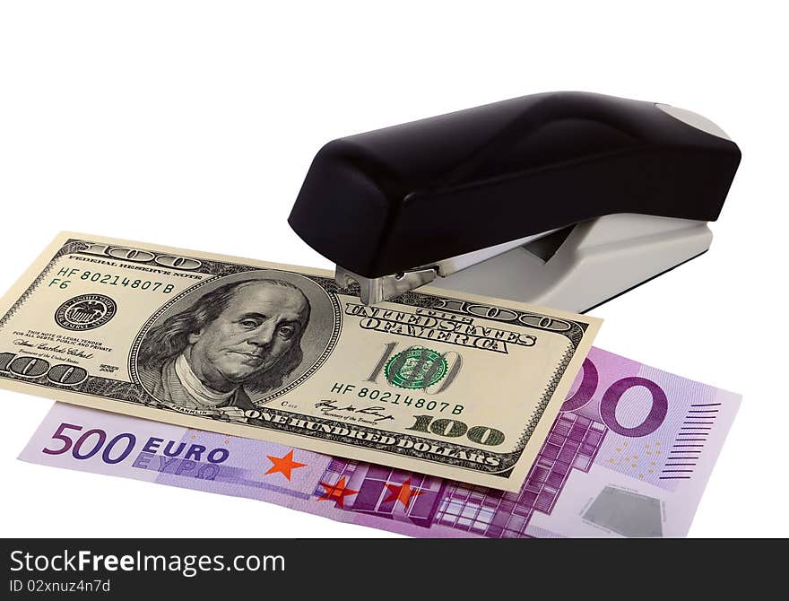 Banknotes of various currencies in an environment of staplers of the different sizes and colors. Symbolizes interrelation of various world currencies. The file includes a clipping path so it is easy to work with. Banknotes of various currencies in an environment of staplers of the different sizes and colors. Symbolizes interrelation of various world currencies. The file includes a clipping path so it is easy to work with.