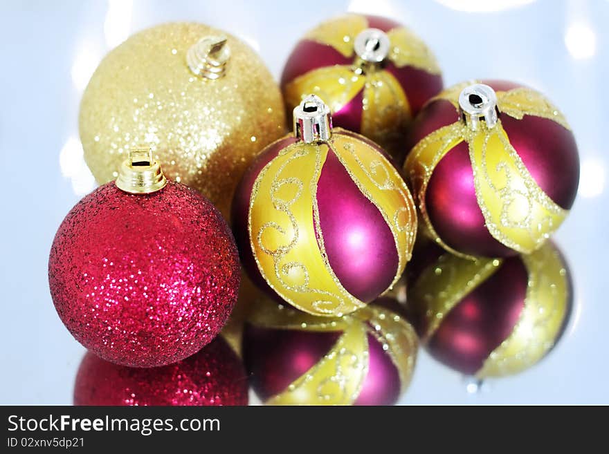 Five Christmas balls on a blue background