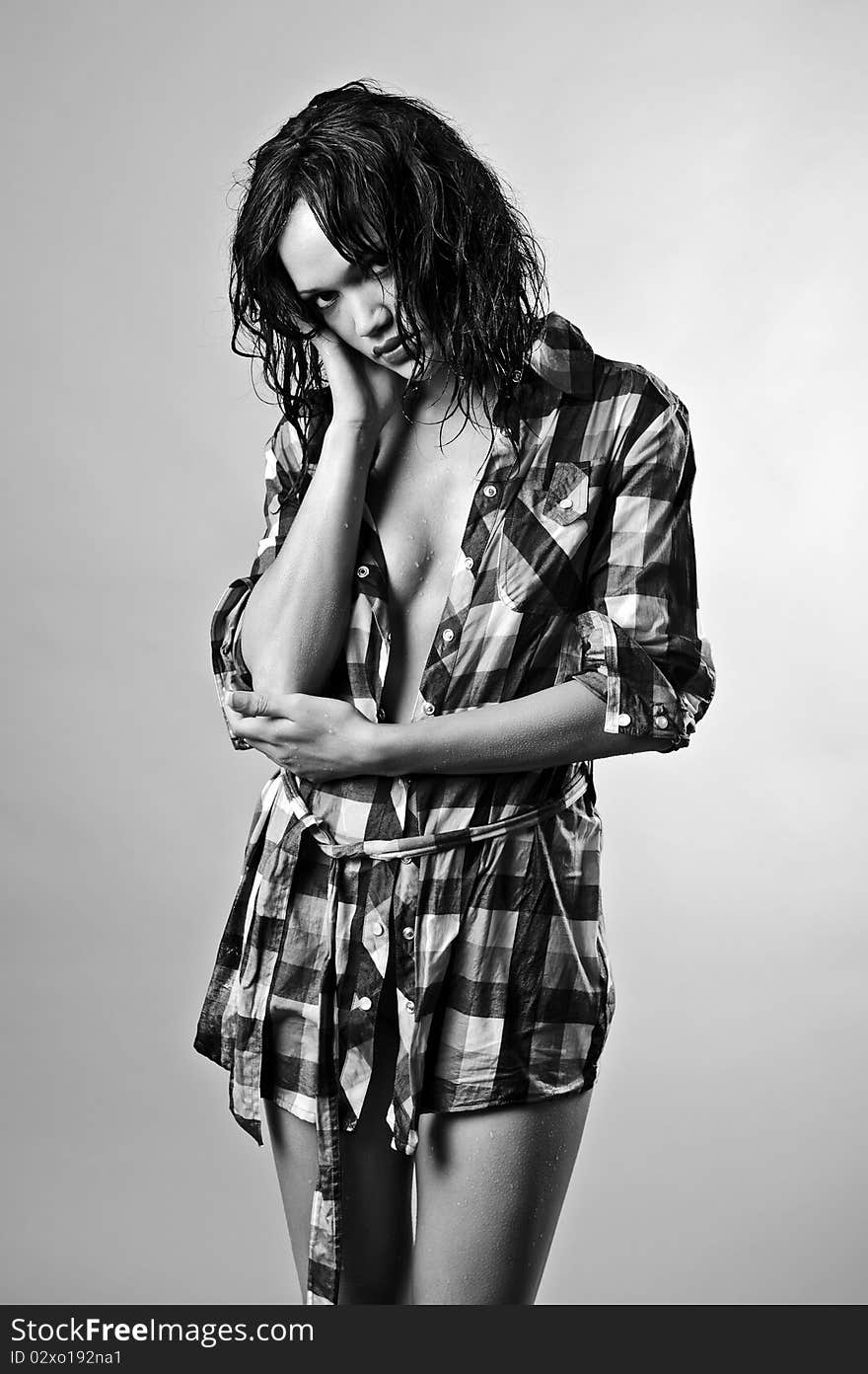 Sexy wet fashion model poses in black and white. Sexy wet fashion model poses in black and white