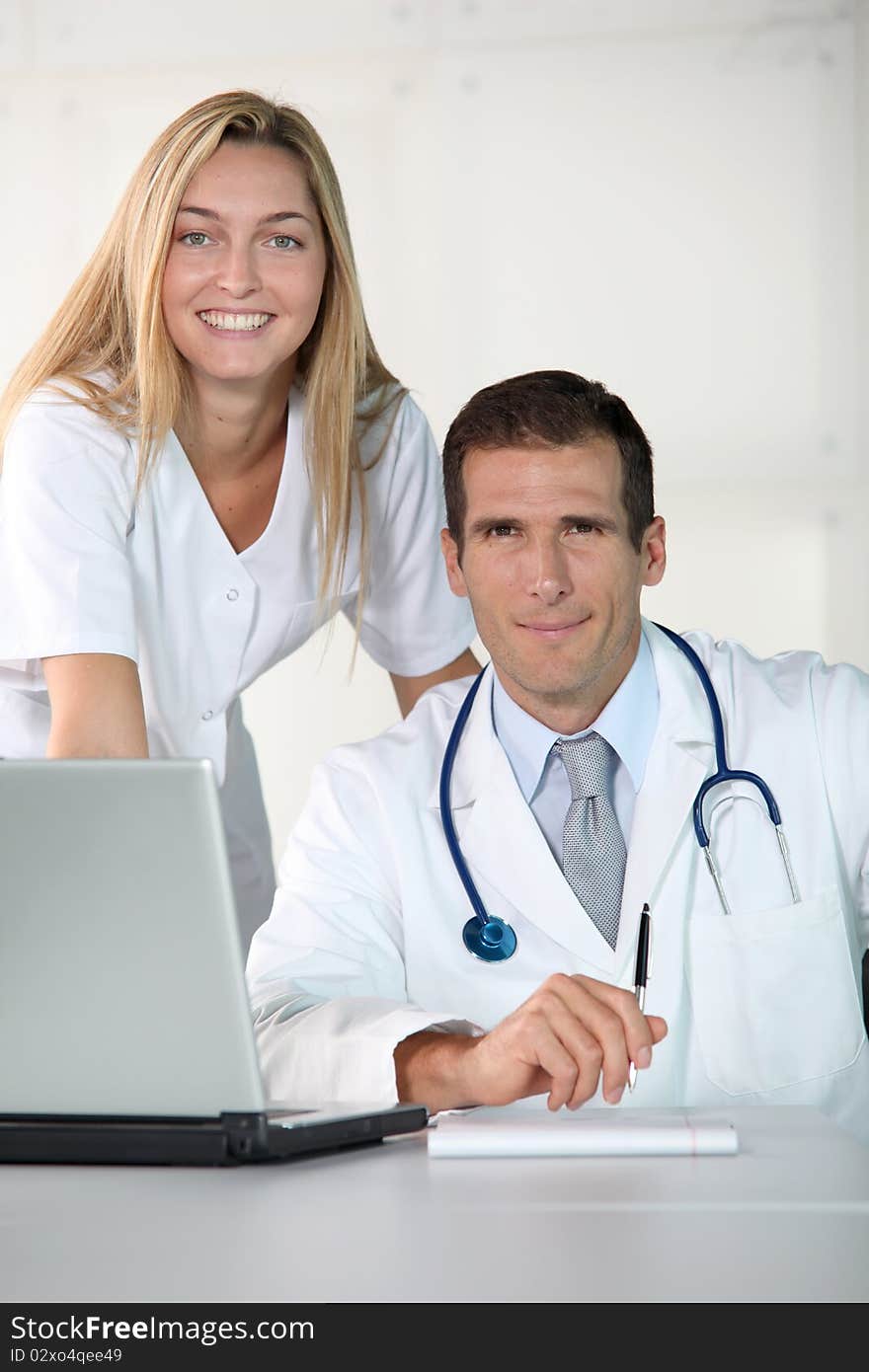 Closeup of doctor and nurse in the office. Closeup of doctor and nurse in the office