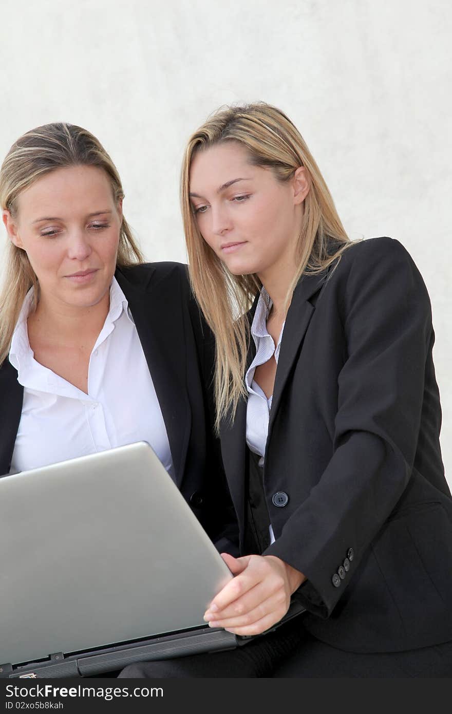 Businesswomen meeting outside the office