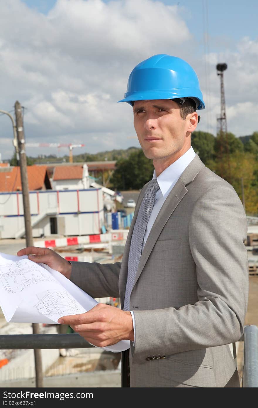 Architect standing on building site