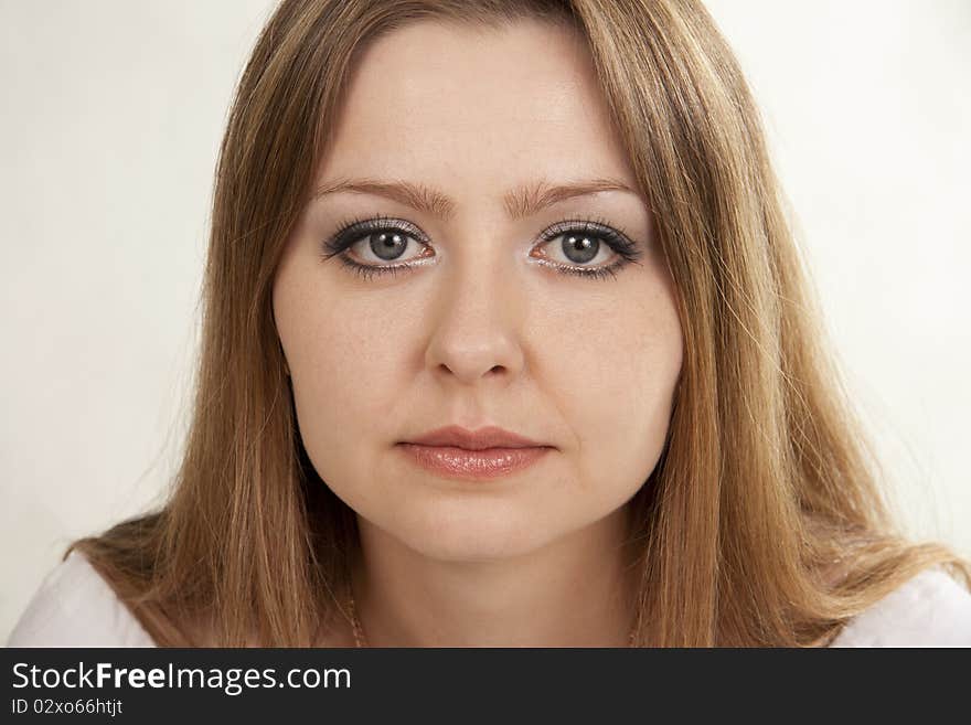 Beautiful woman sad. White background