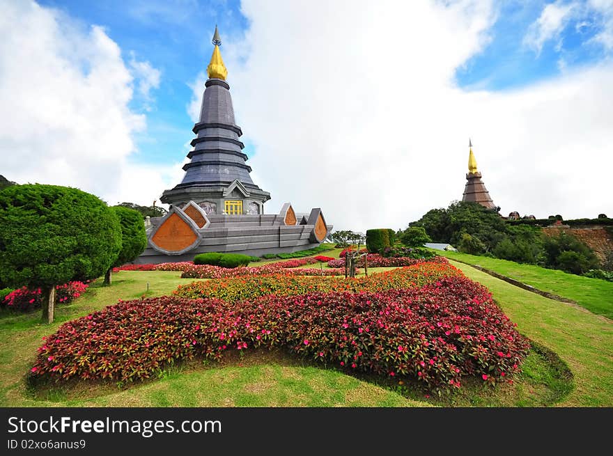 Napapon Phoom-siri Chedi - a temple dedicated to the Queen of Thailand commemorating her 60th birthday near the summit of Doi Inthanon, Thailand's highest peak. Napapon Phoom-siri Chedi - a temple dedicated to the Queen of Thailand commemorating her 60th birthday near the summit of Doi Inthanon, Thailand's highest peak